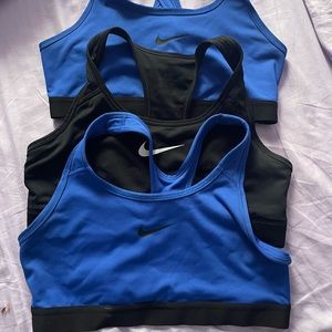 bundle of 4 nike sports bras. white bra not pictured